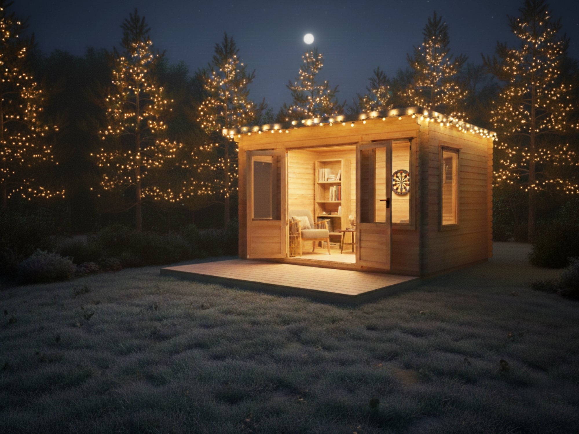 Wooden cabin in a forest at night with lights on, surrounded by trees.