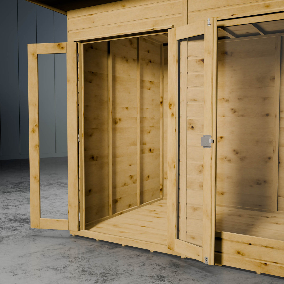 Wooden summer house with open doors on a concrete floor against a grey wall.