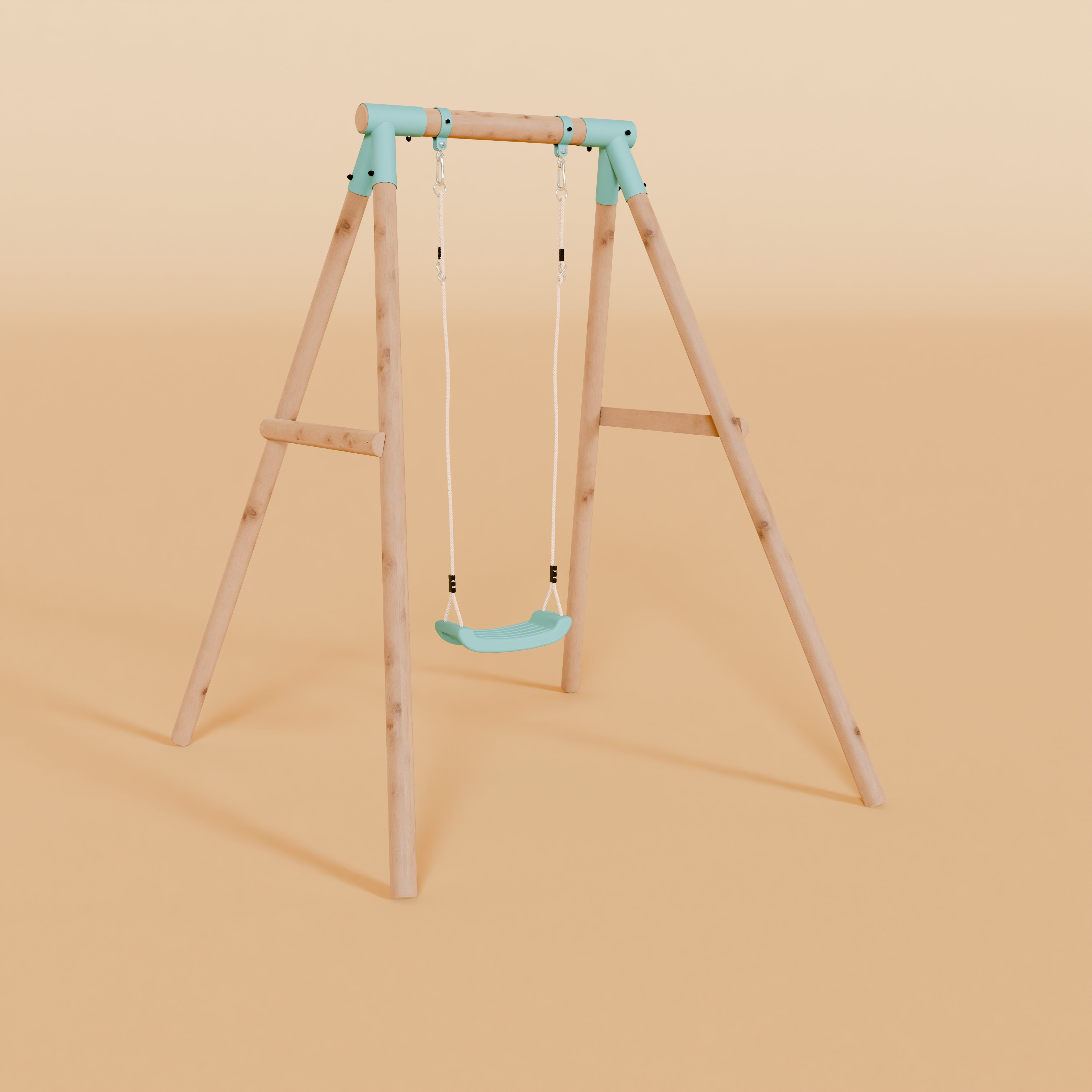Wooden swing set with a blue seat on a beige background