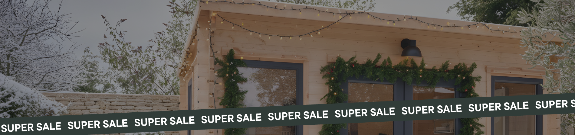 Log cabin with Christmas decorations and 'Super Sale' signs on a snowy day
