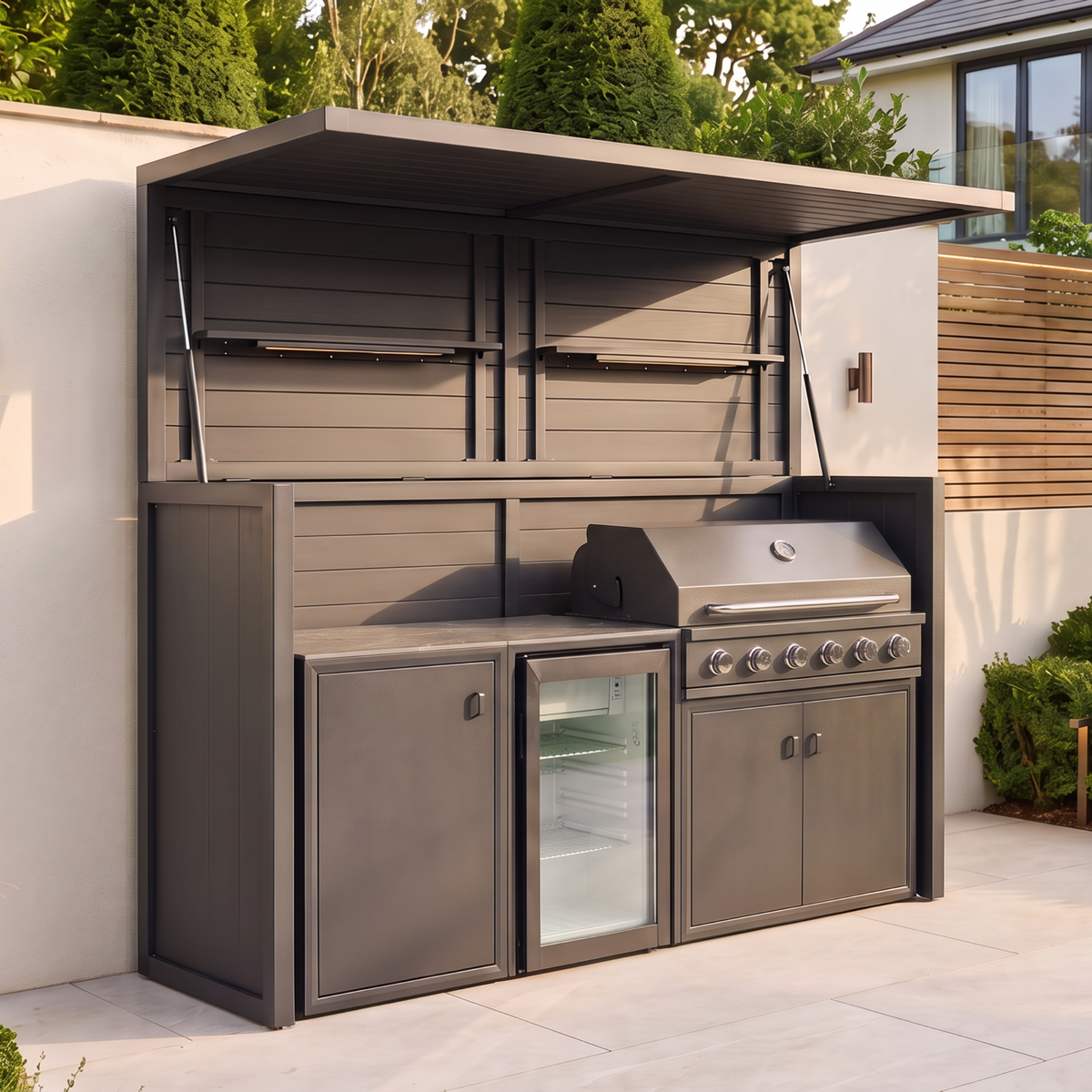 Vantage Outdoor Kitchen Pod with 6 Burner Gas BBQ and Fridge, open on a patio by day, Grey