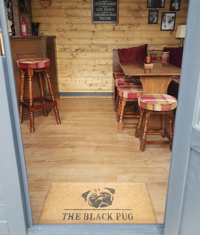 Laminate flooring in The Black Pug log cabin Laminate flooring in The Black Pug log cabin