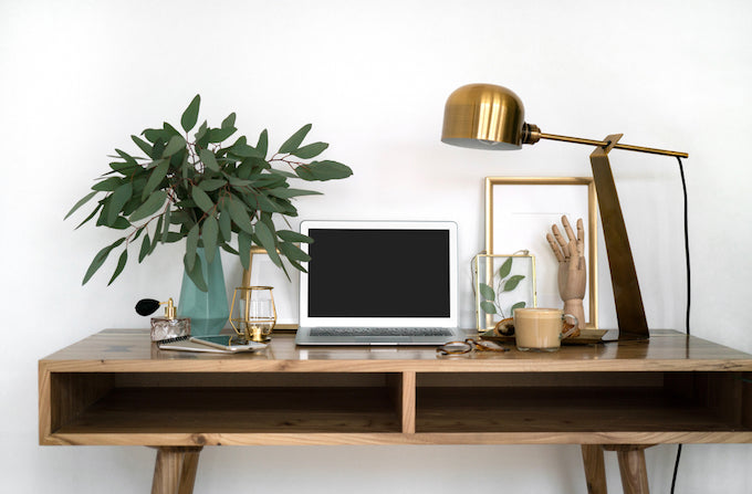 Office interior with a desk and greenery Office interior with a desk and greenery