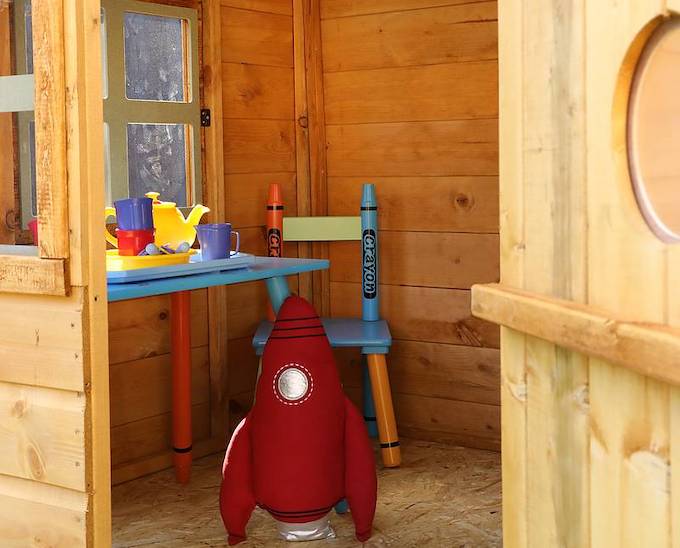 Inside view of a Waltons Snug Playhouse with toys Inside view of a Waltons Snug Playhouse with toys