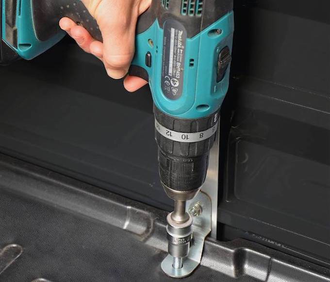 Anchor bolting a plastic shed to base Anchor bolting a plastic shed to base