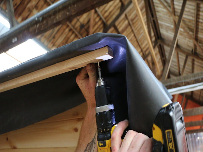 batons under eaves to hold epdm in place