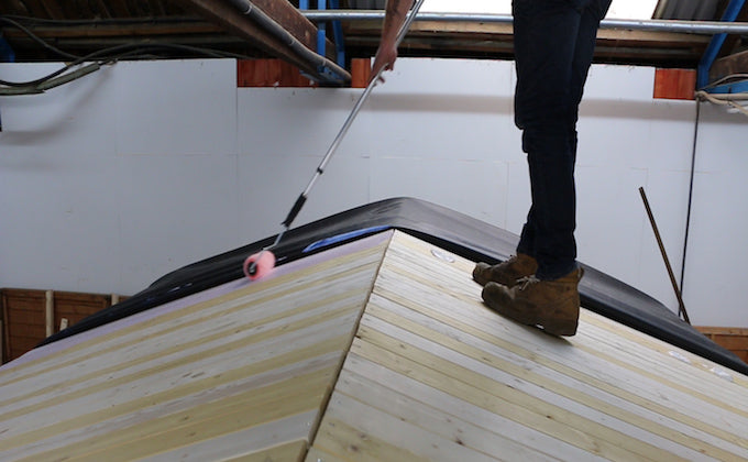 applying glue to stick epdm on a shed roof applying glue to stick epdm on a shed roof