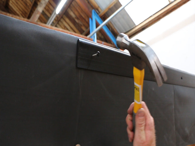 applying plastic capping to epdm shed roof