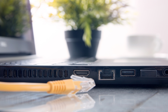 Eternet cable plugging into laptop Eternet cable plugging into laptop