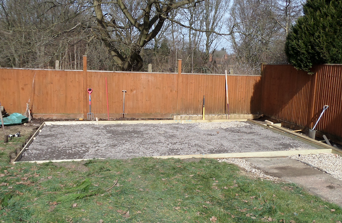 Timber frame surrounding shed base Timber frame surrounding shed base