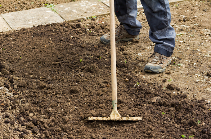 Levelling the ground before adding concrete Levelling the ground before adding concrete