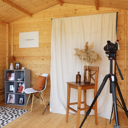 A log cabin being used as a photography studio