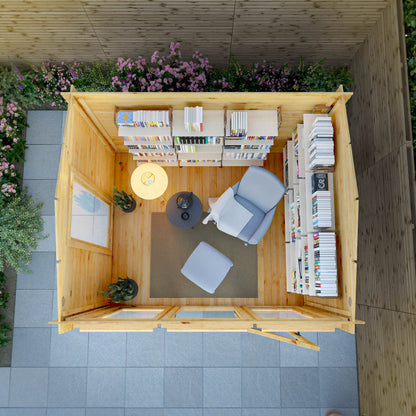 A modern log cabin with single door, full length windows, apex roof, decorated for reading and relaxation. 