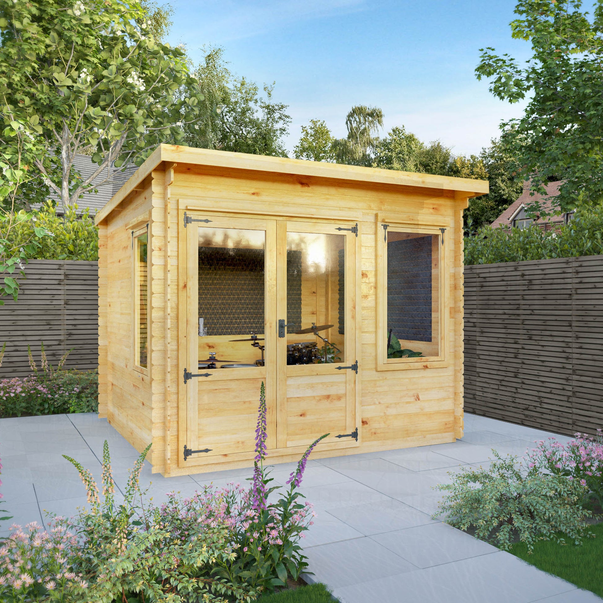 A timber log cabin with pent roof, large windows and double doors, set in a garden used as a music room