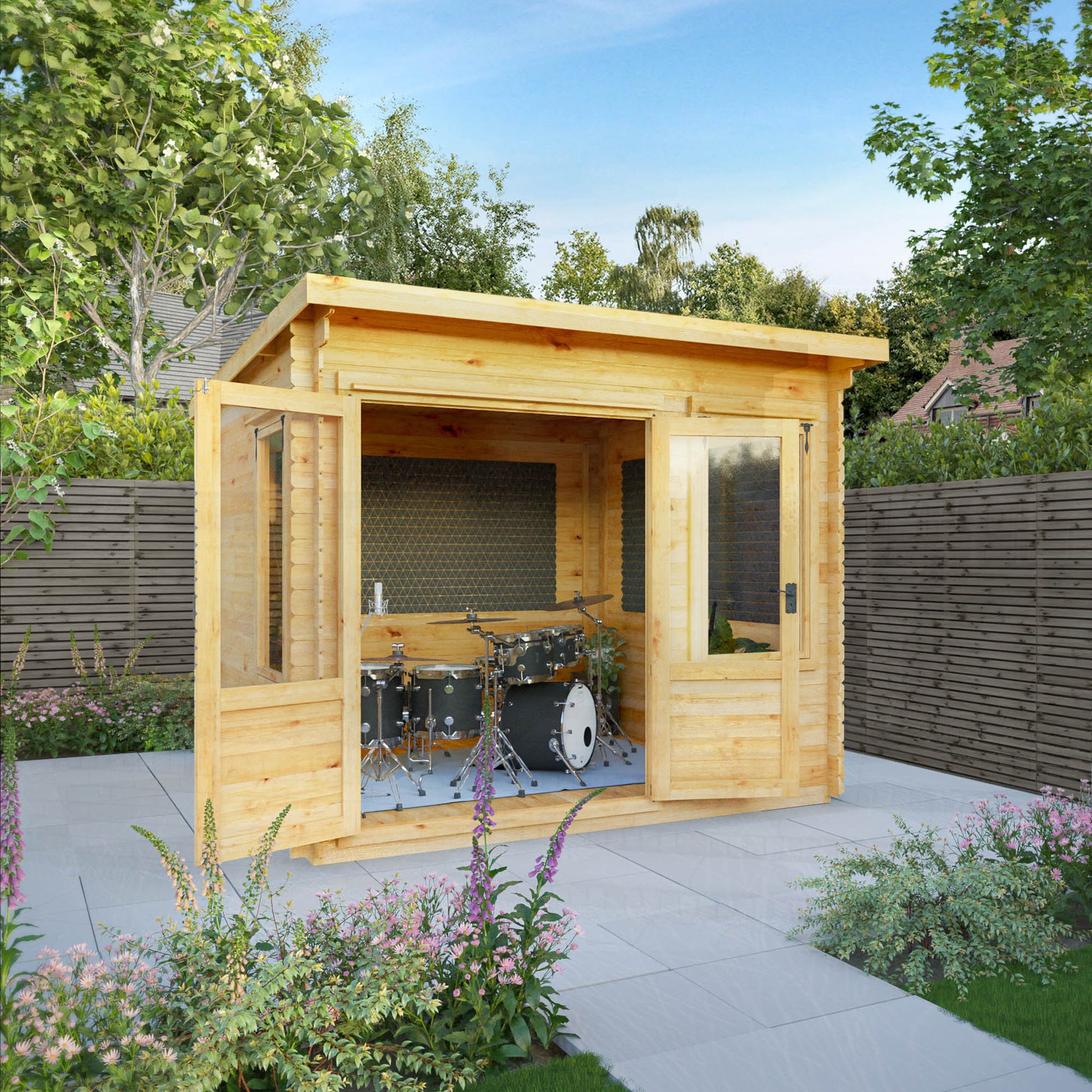 A timber log cabin with pent roof, large windows and double doors, set in a garden used as a music room