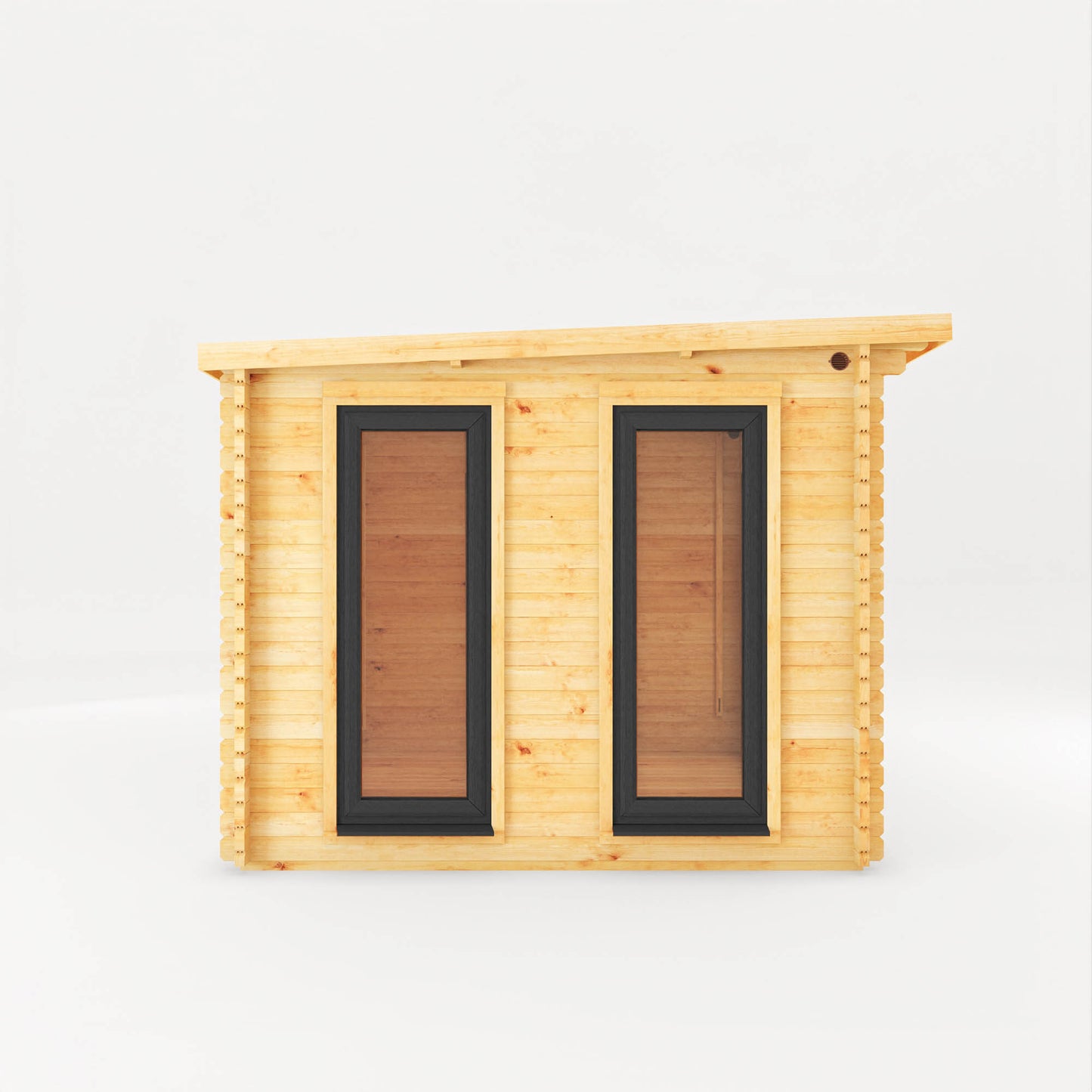 A modern log cabin with full length grey UPVC windows and pent roof