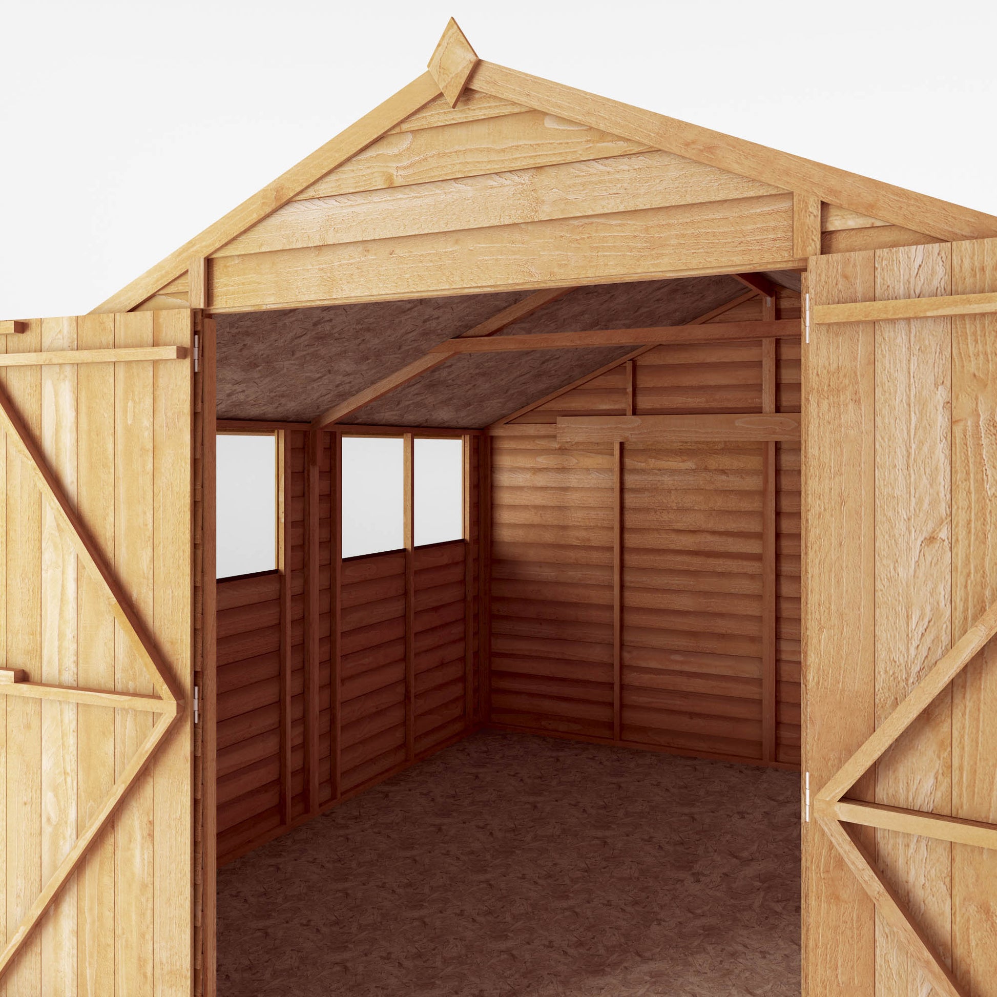 A large shed with double doors and windows, used for storage purposes
