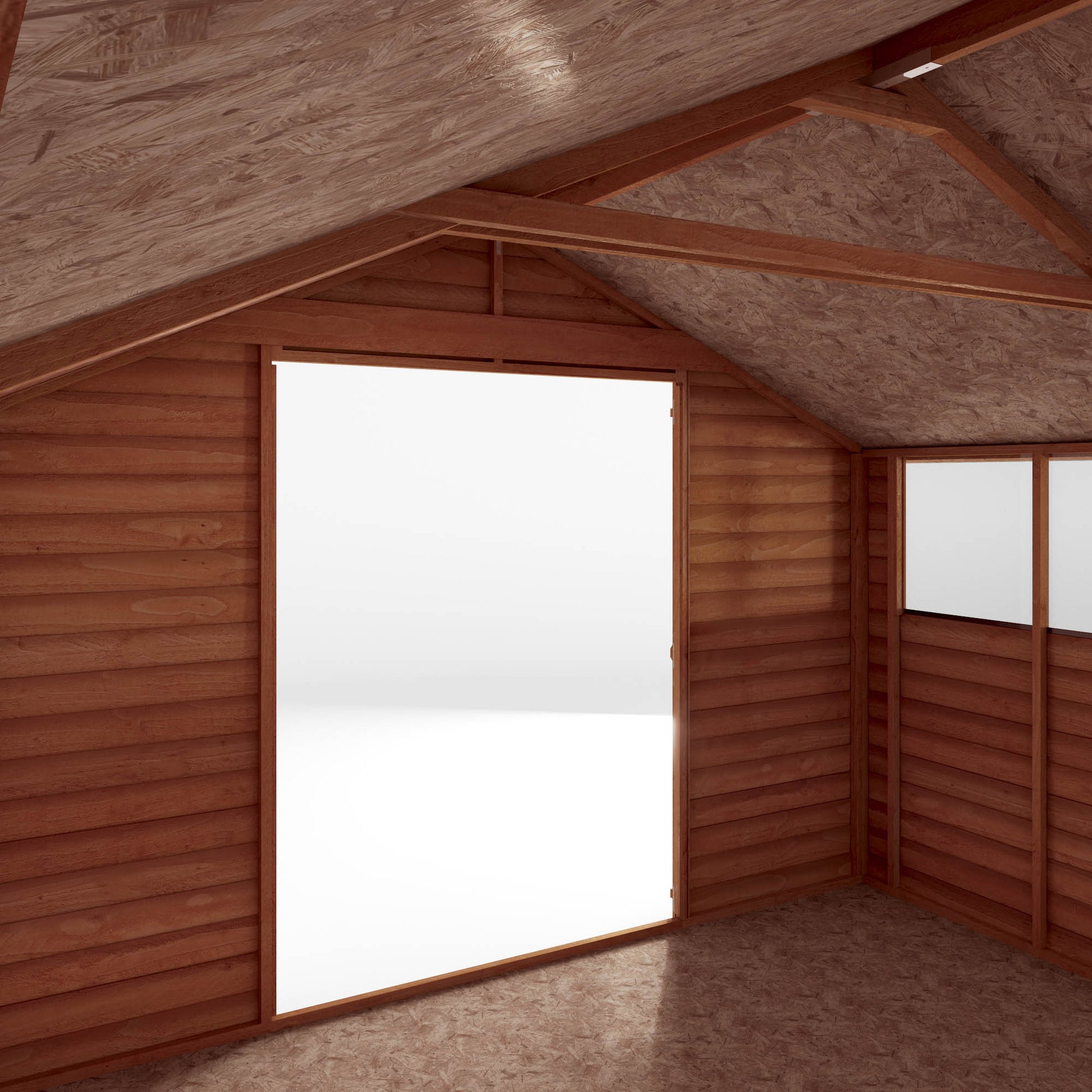 A large shed with double doors and windows, used for storage purposes