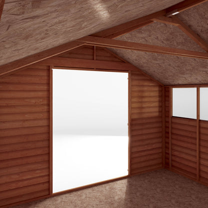 A large shed with double doors and windows, used for storage purposes
