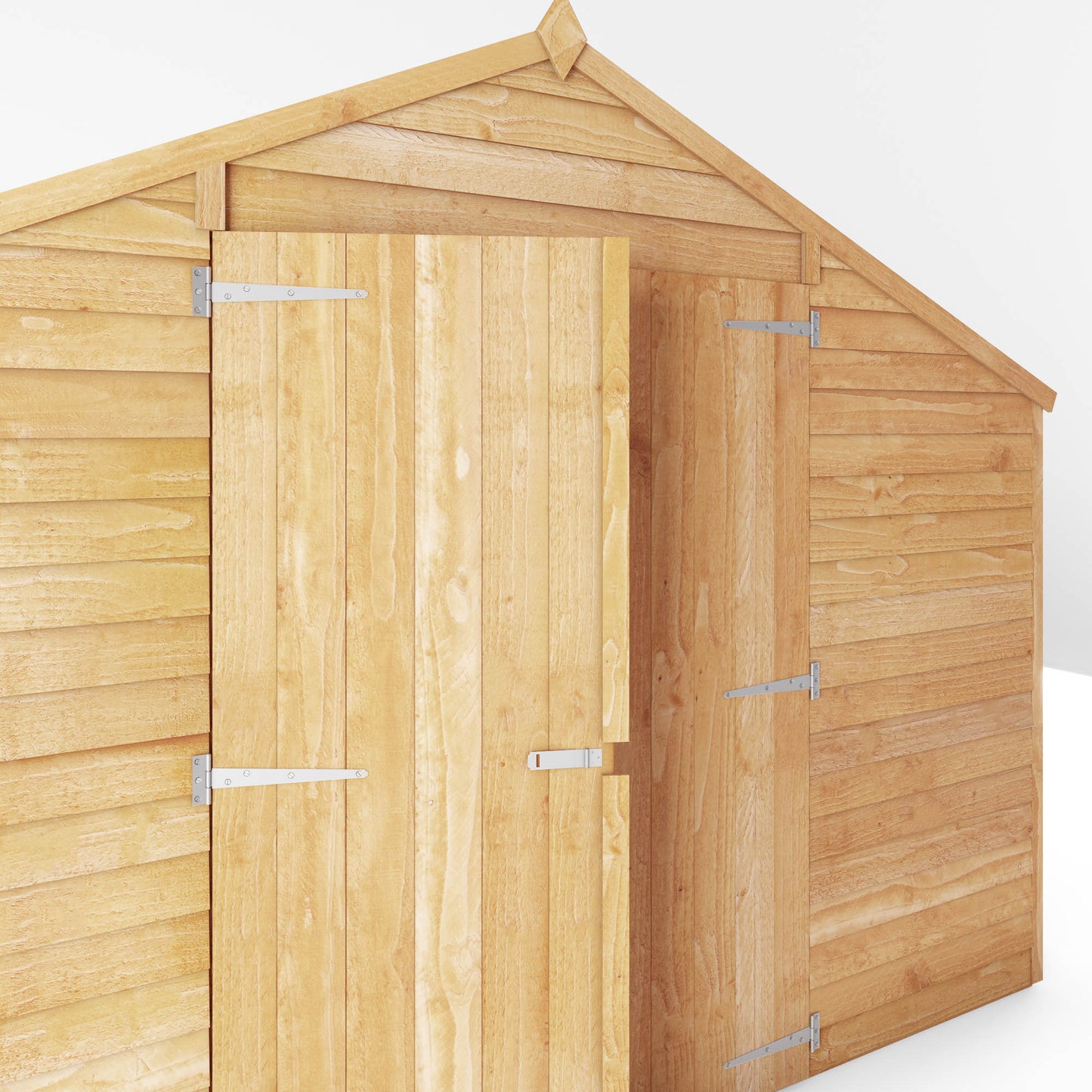 A large shed with double doors and windows, used for storage purposes