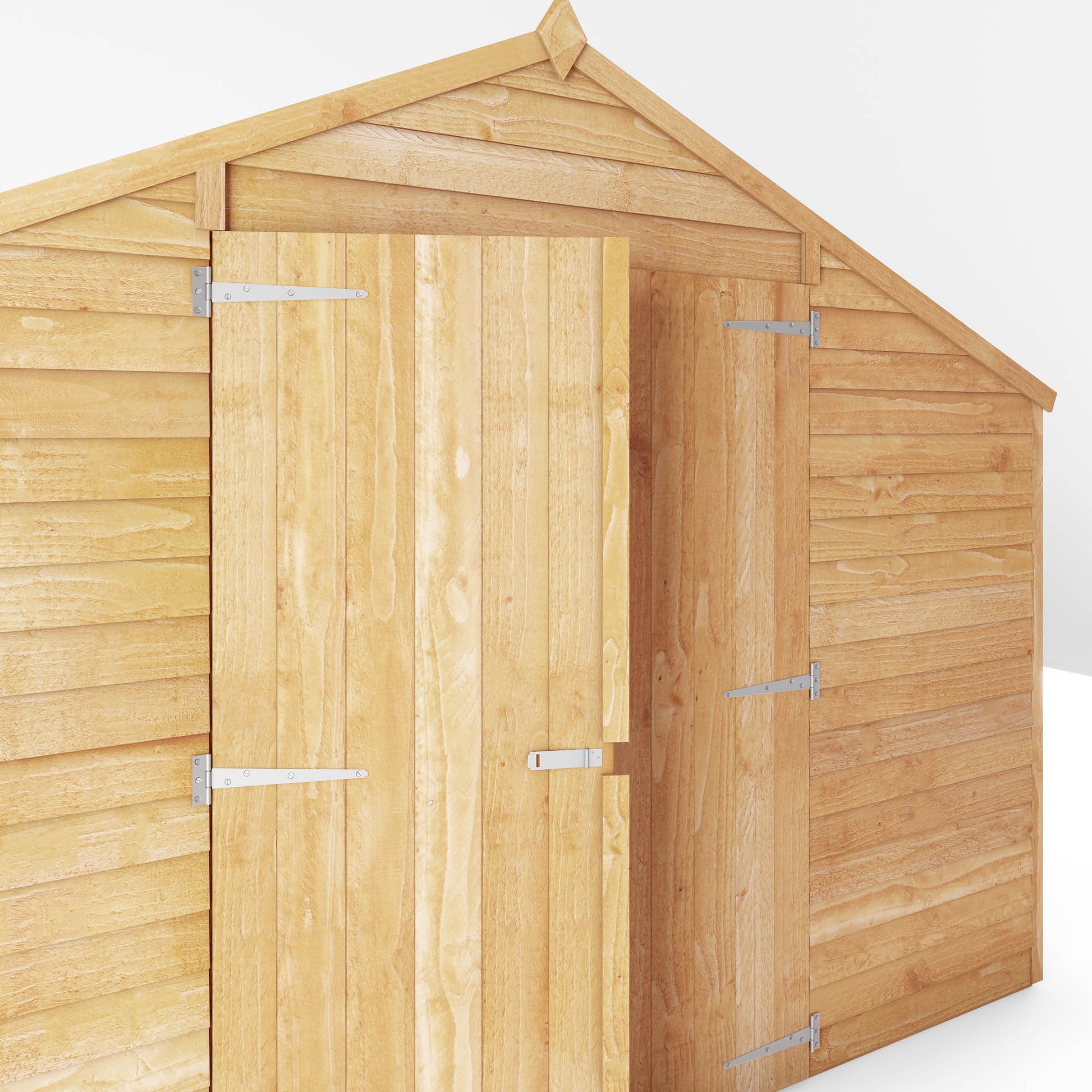 A large shed with double doors and windows, used for storage purposes