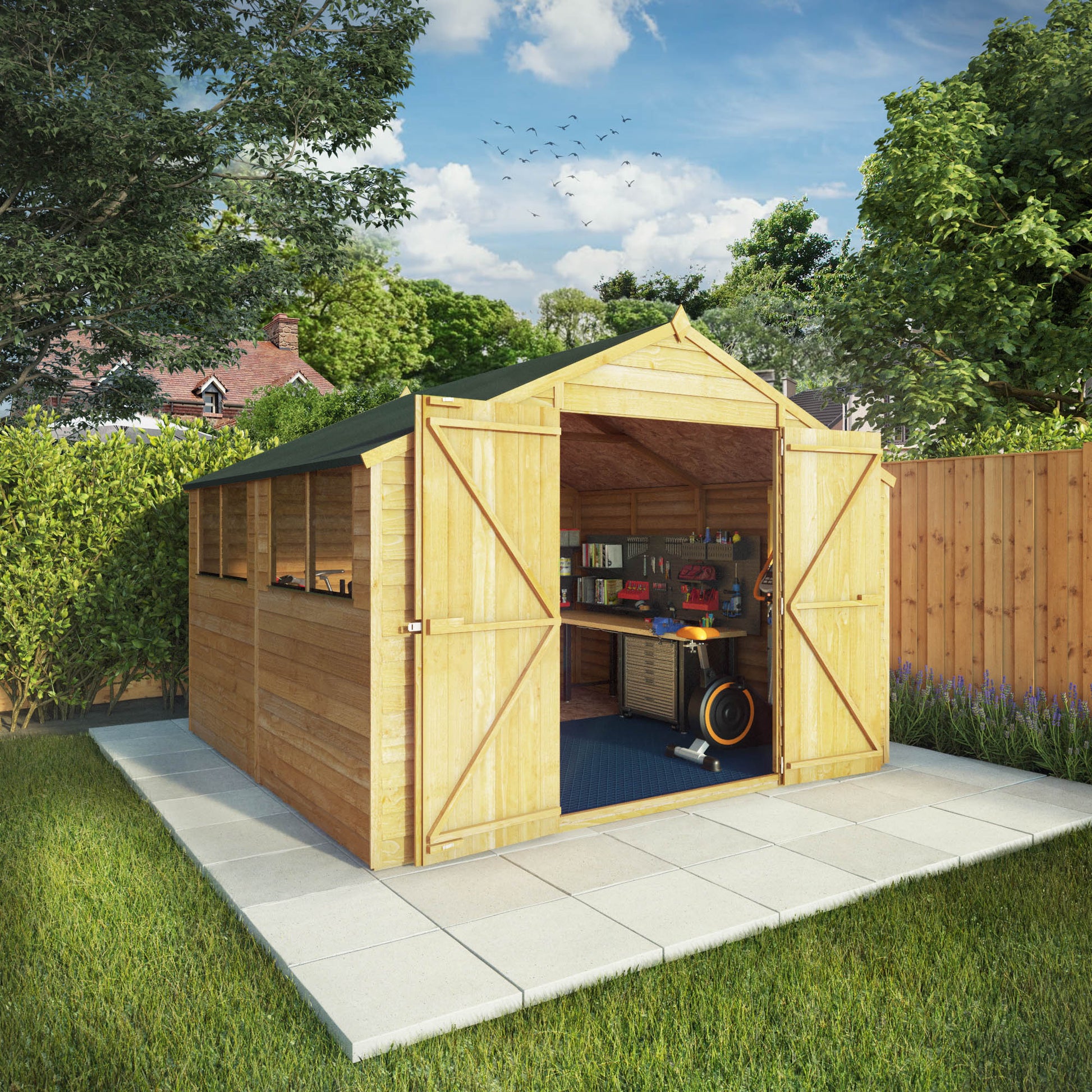 A large shed with double doors and windows, used for storage purposes