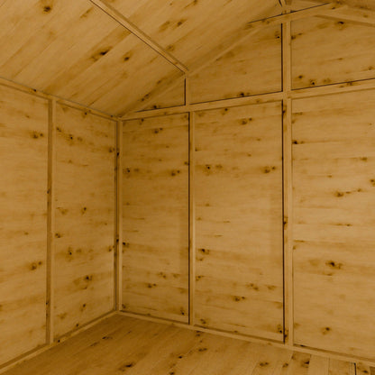 Wooden interior of a shed with an apex roof