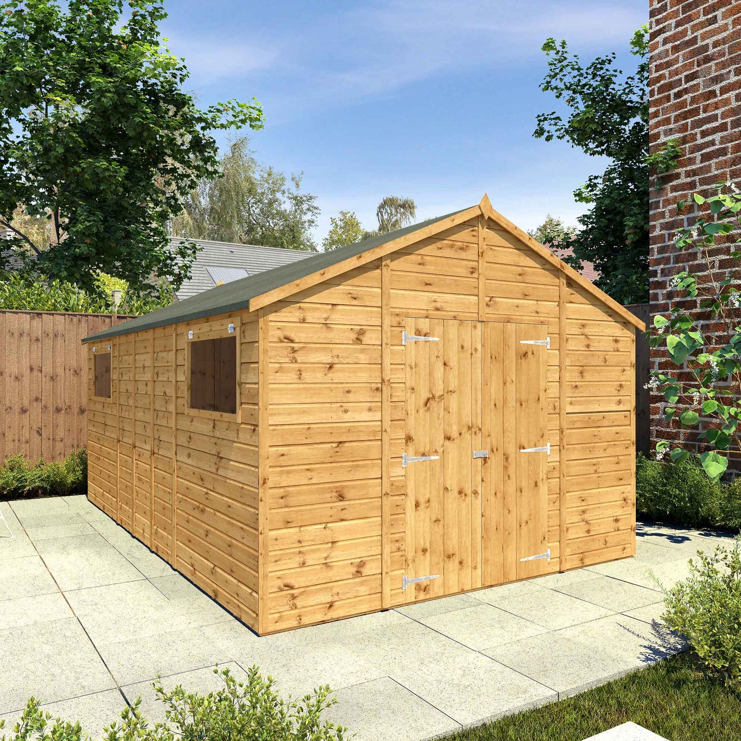 A large timber workshop with double doors, apex roof and windows