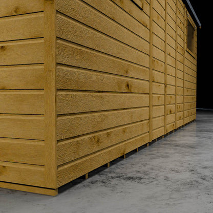 Wooden shiplap shed cladding with a styrene window in a darkened setting.