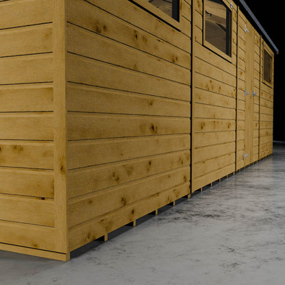Wooden shiplap cladding also showing three styrene windows and single wooden door.
