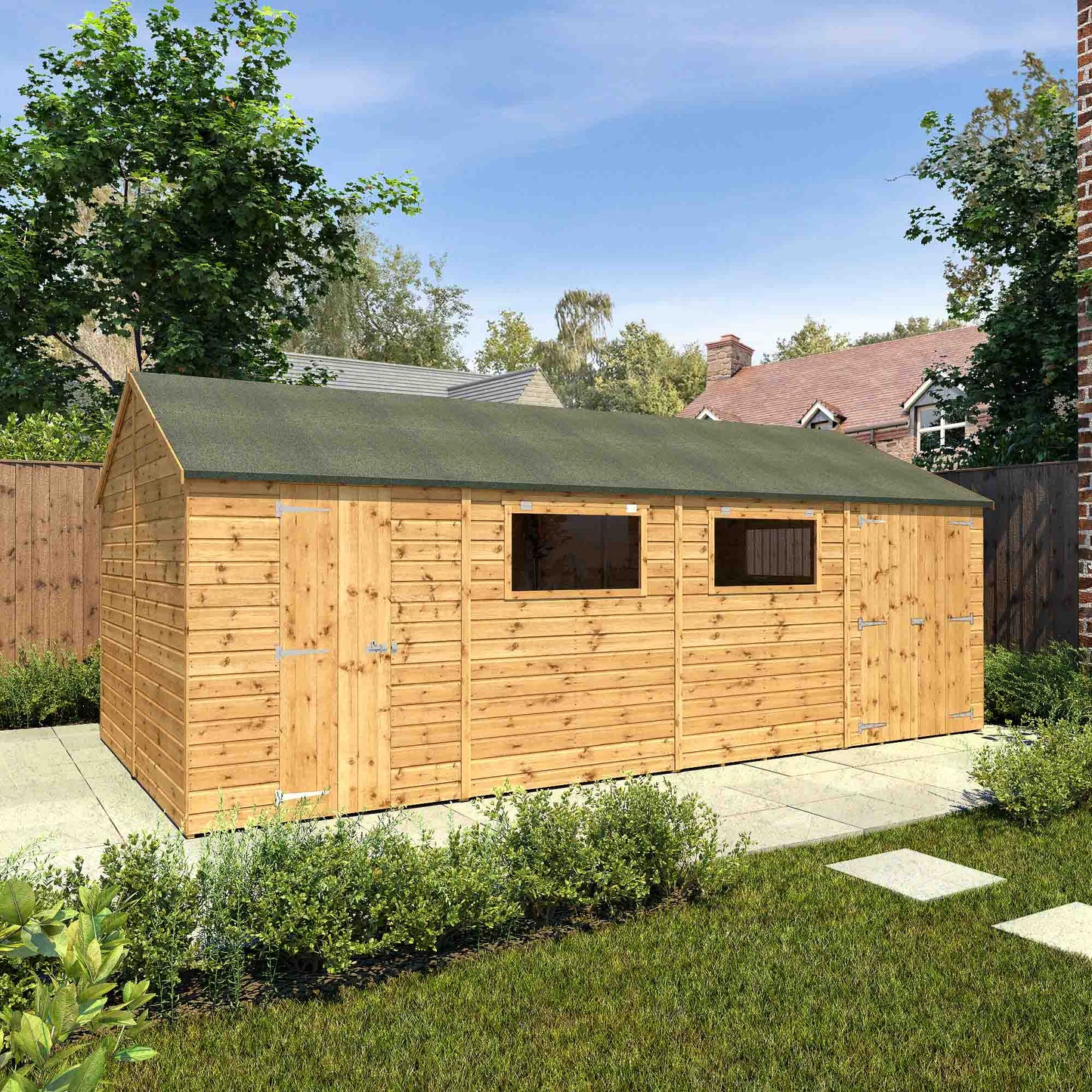 A large workshop with three doors, windows and felt roof, made from timber