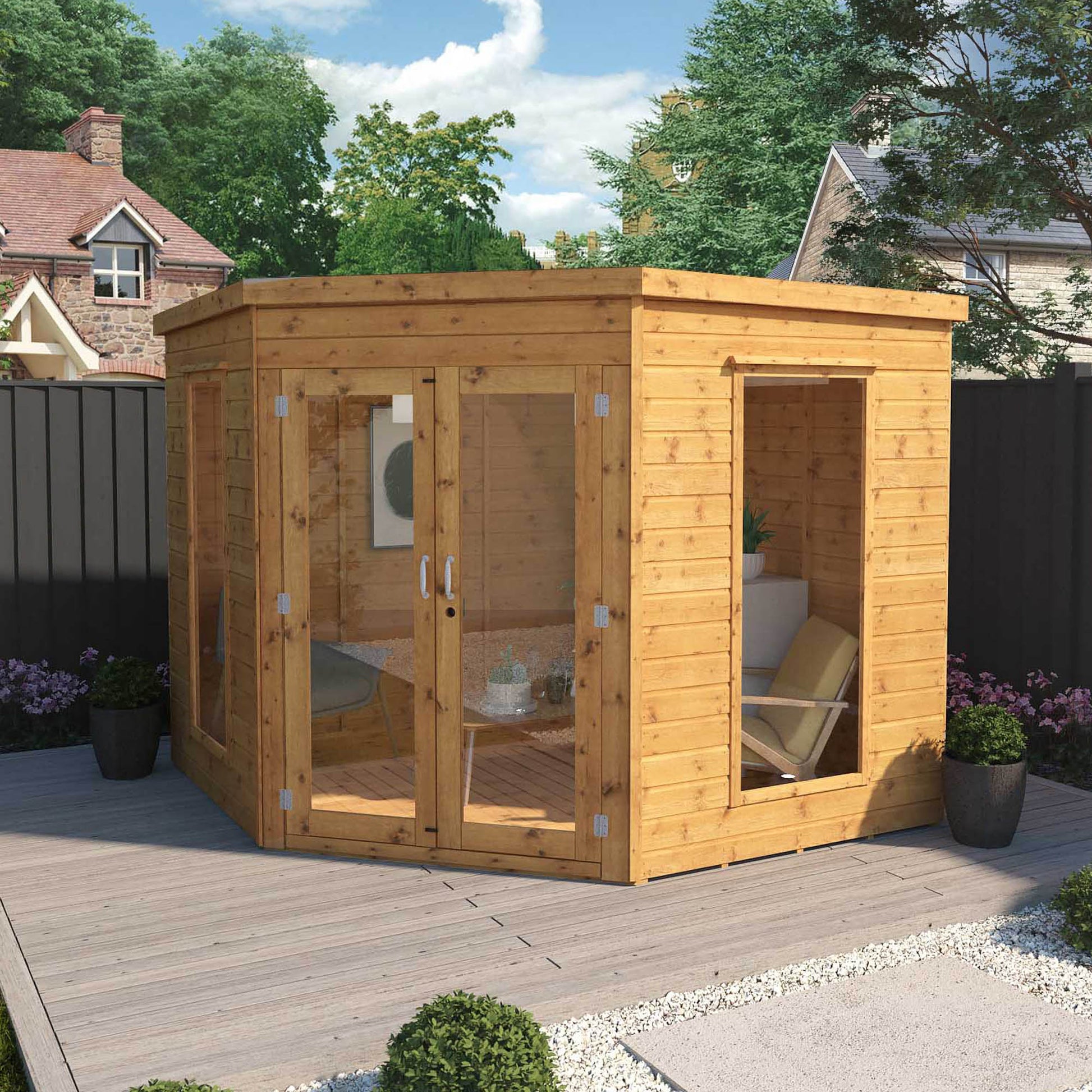 A timber corner summerhouse with double doors and full length windows