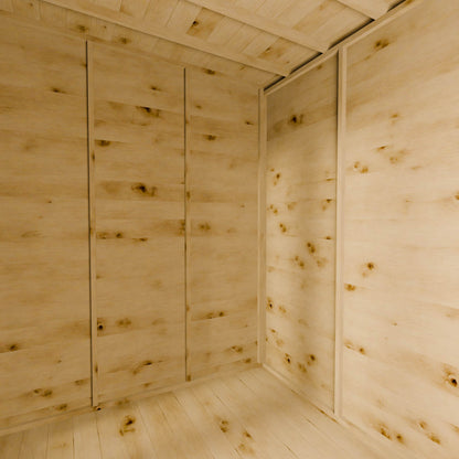 Wooden cabin interior with walls and ceiling made of light wood planks.