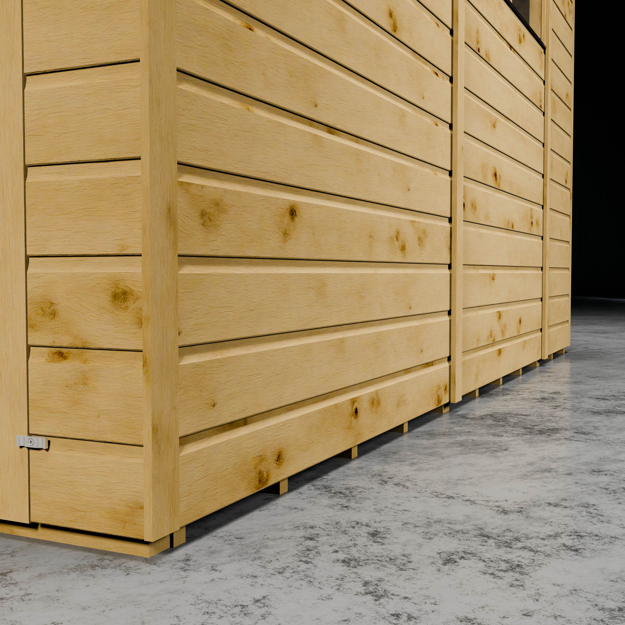 Wooden shed with shiplap cladding on concrete floor.