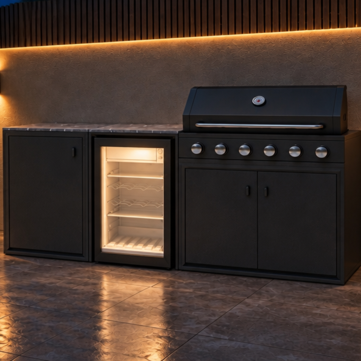 Vantage Compact Outdoor Kitchen with 6 Burner Gas BBQ and Fridge, lit at night, Grey#colour_grey