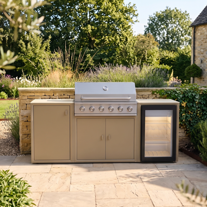 Vantage Compact Outdoor Kitchen with 6 Burner Gas BBQ and Fridge, on a patio by day, Sand