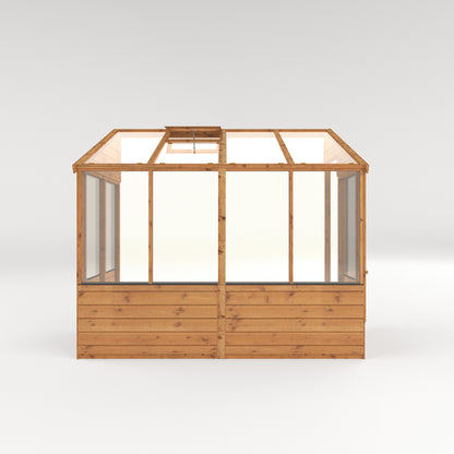 the side of a timber lean-to greenhouse