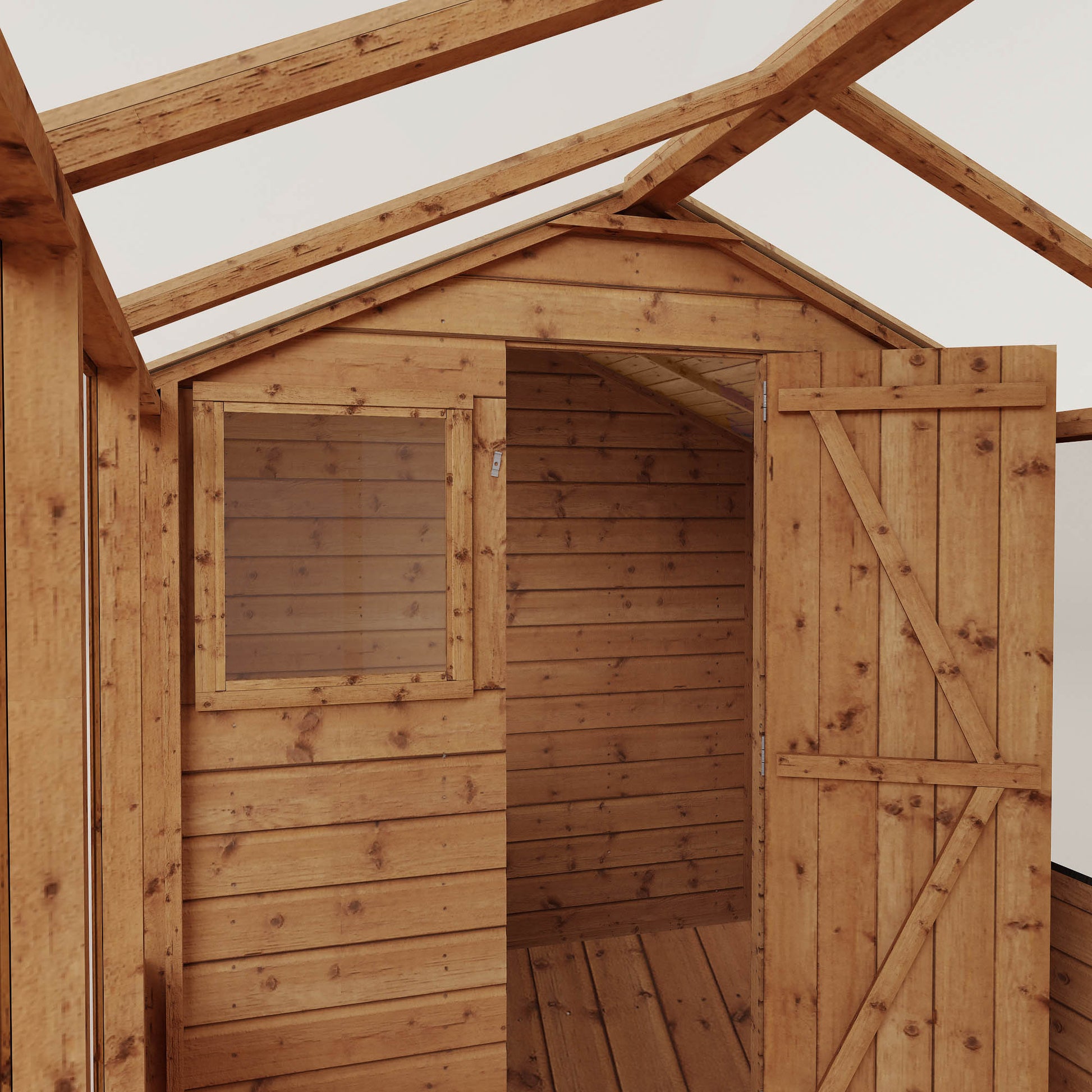 Greenhouse with a shed attached to the back