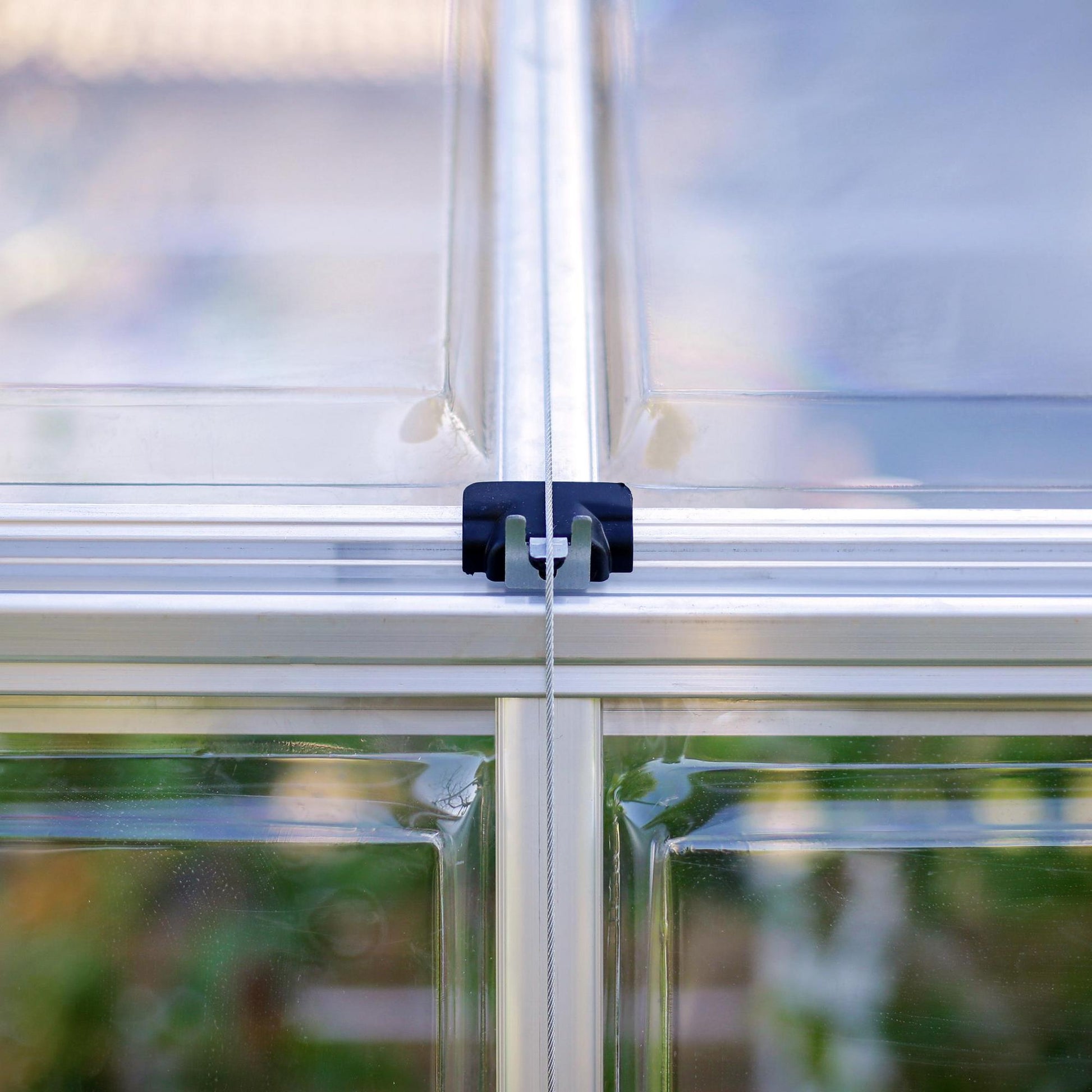 Anchoring kit on a metal greenhouse