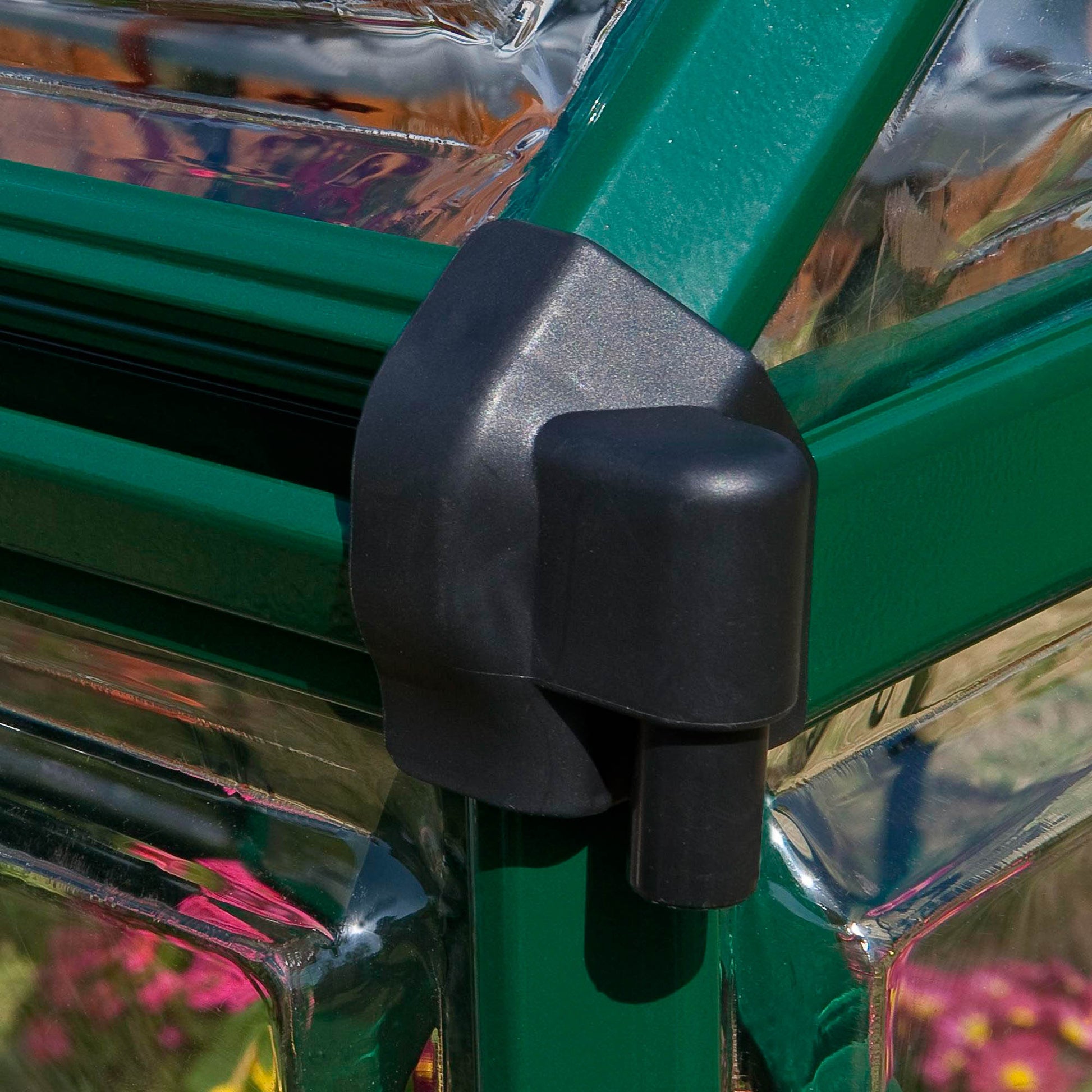 Gutters on a green greenhouse