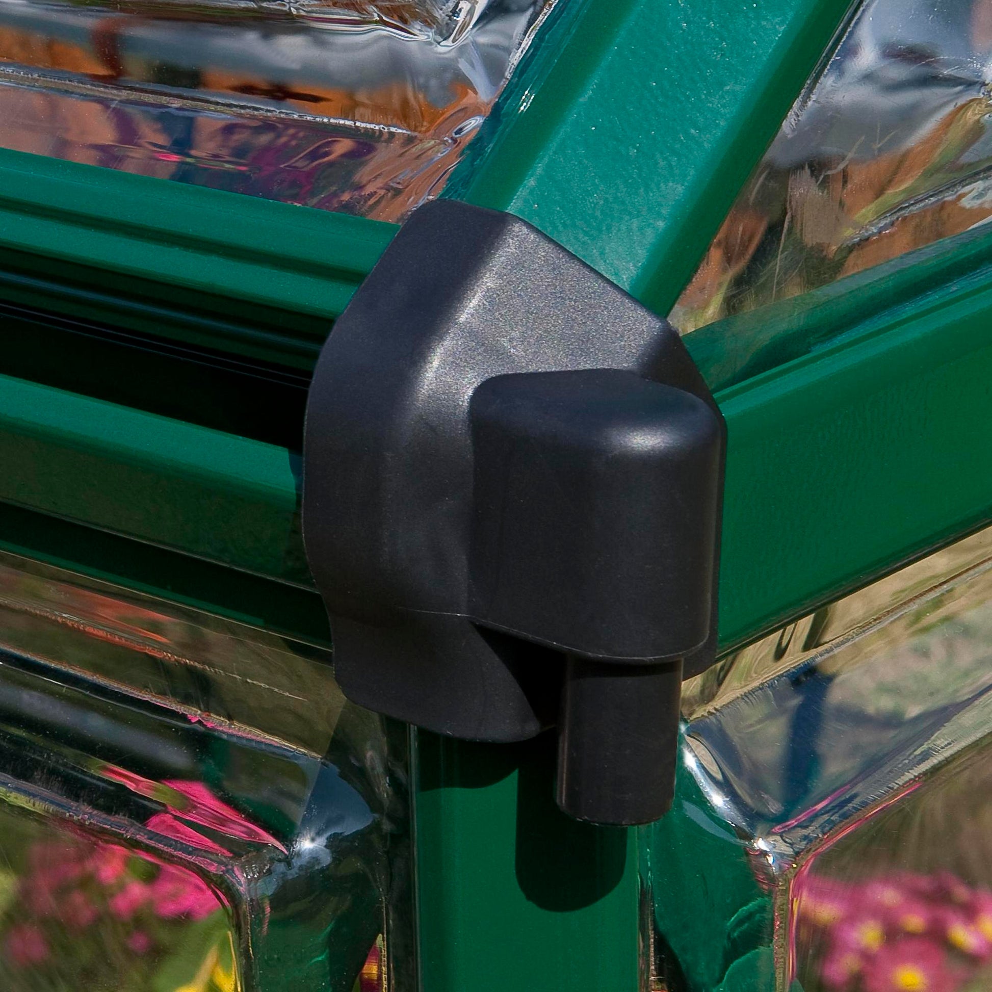 Gutter on a green metal greenhouse