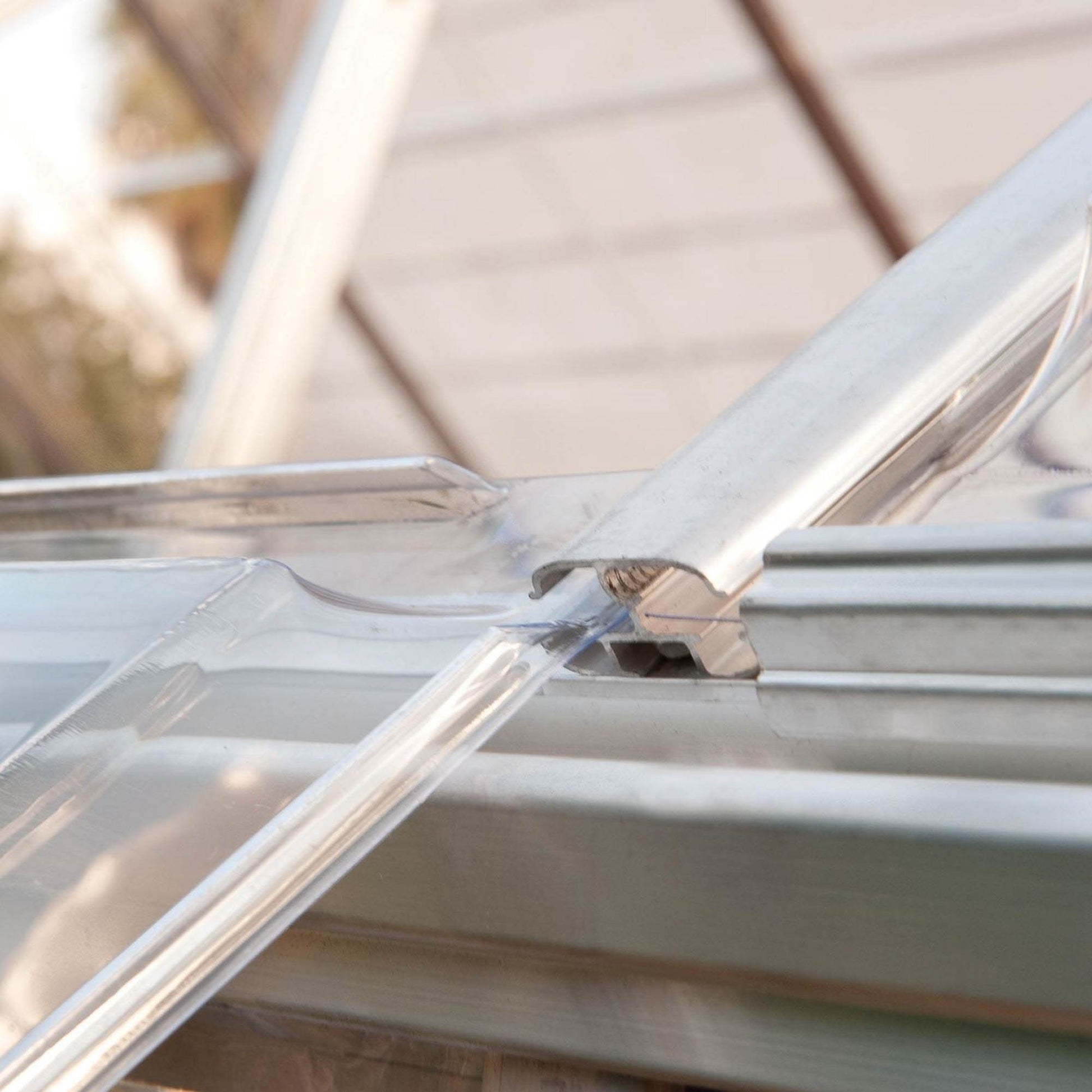 Sliding panels on a greenhouse