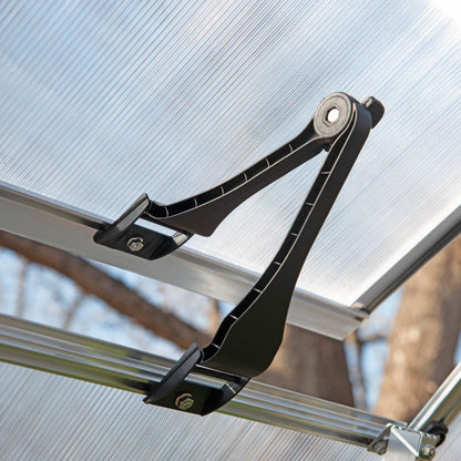 An opening air vent on a greenhouse