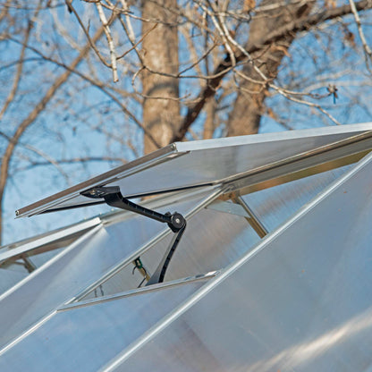 An opening air vent on a greenhouse