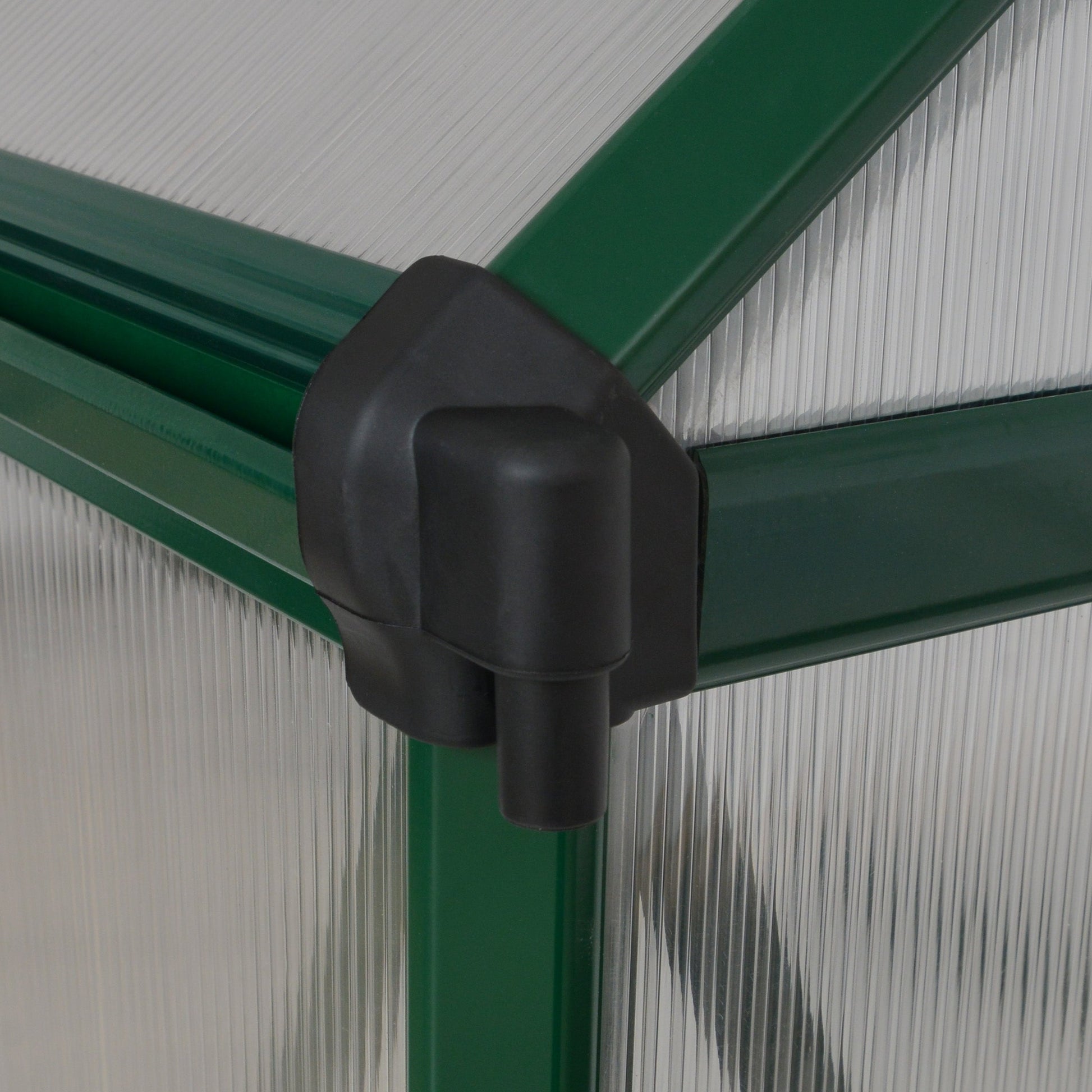 Gutters on a green greenhouse