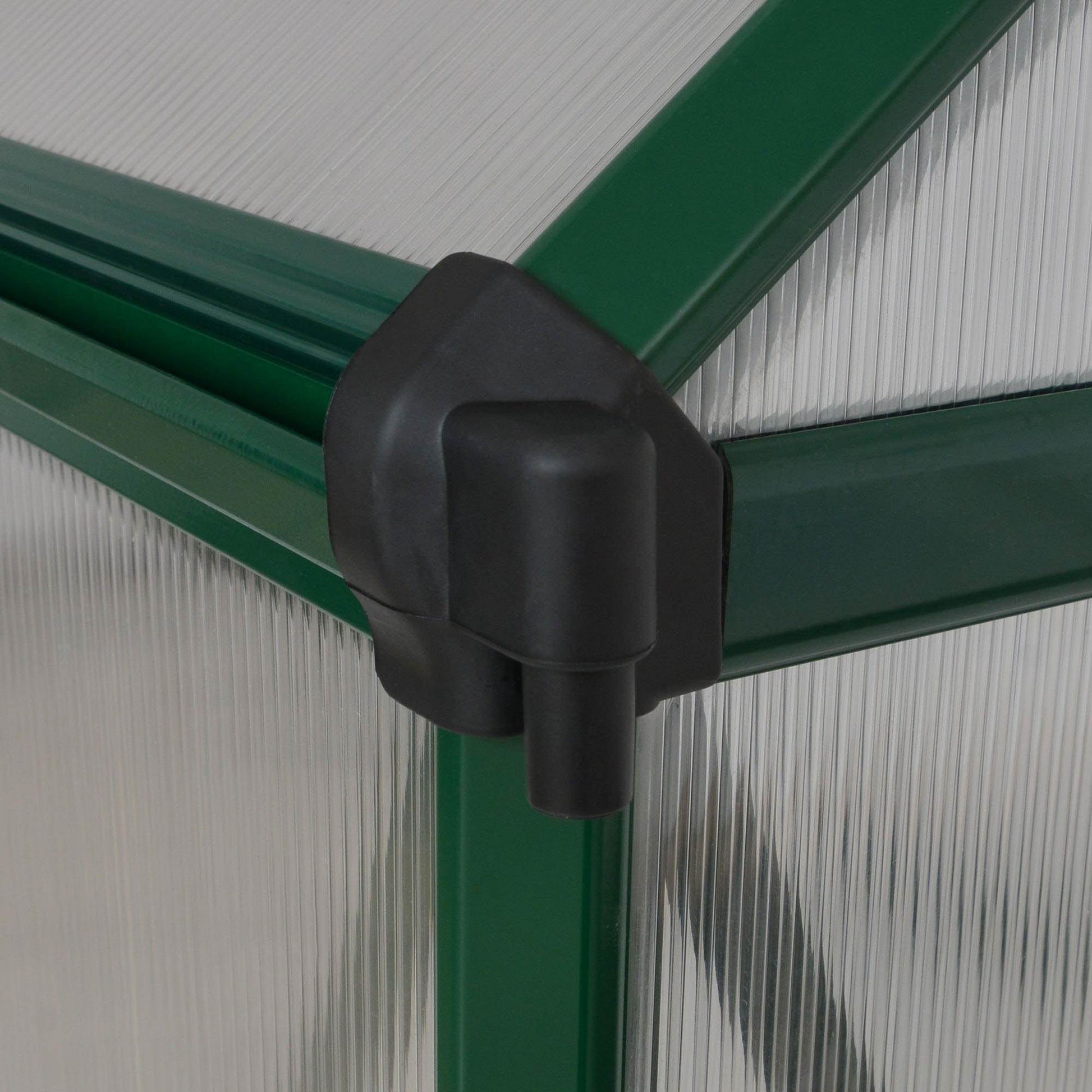 Gutters on a green greenhouse