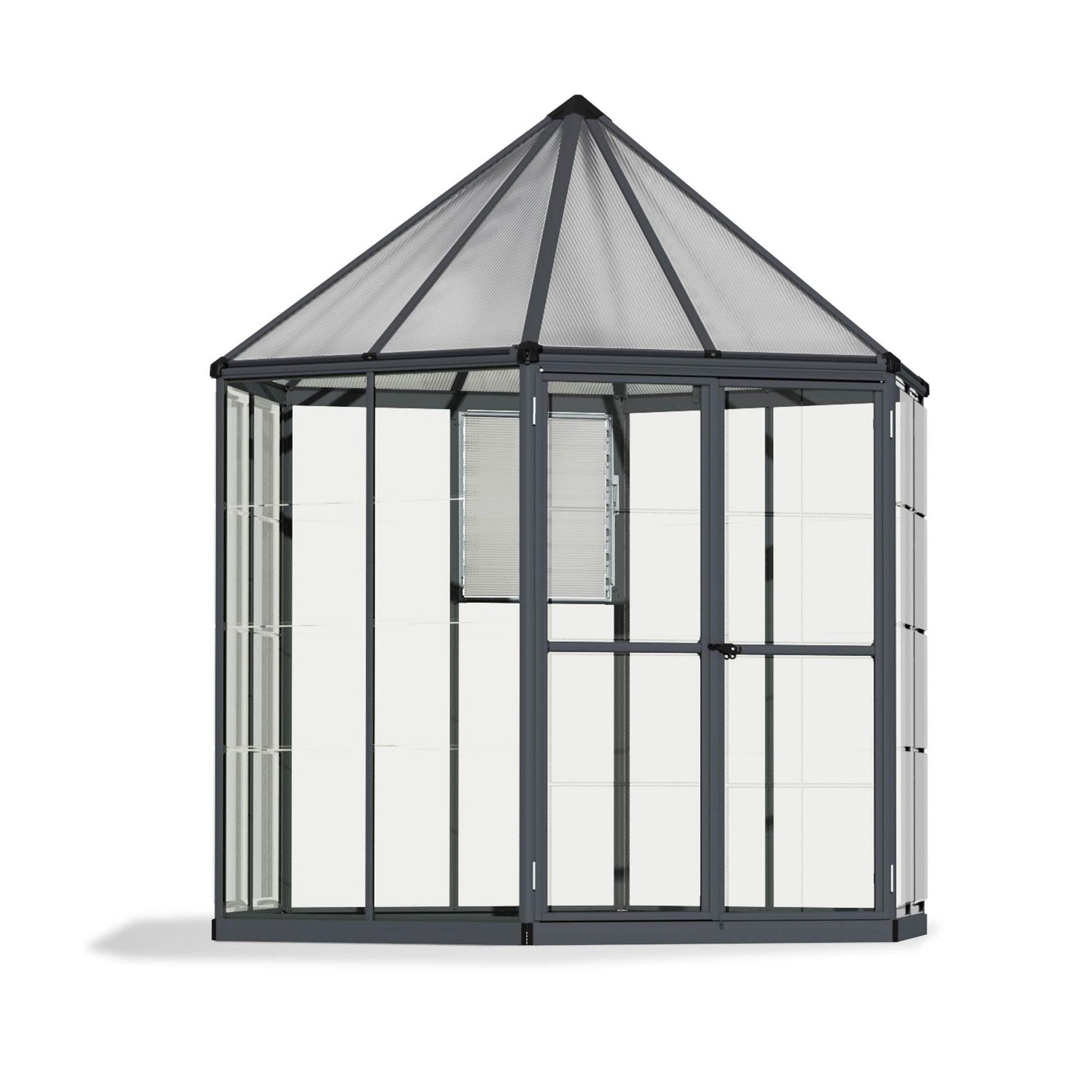 A hexagonal greenhouse with built in shelves and grey metal framing