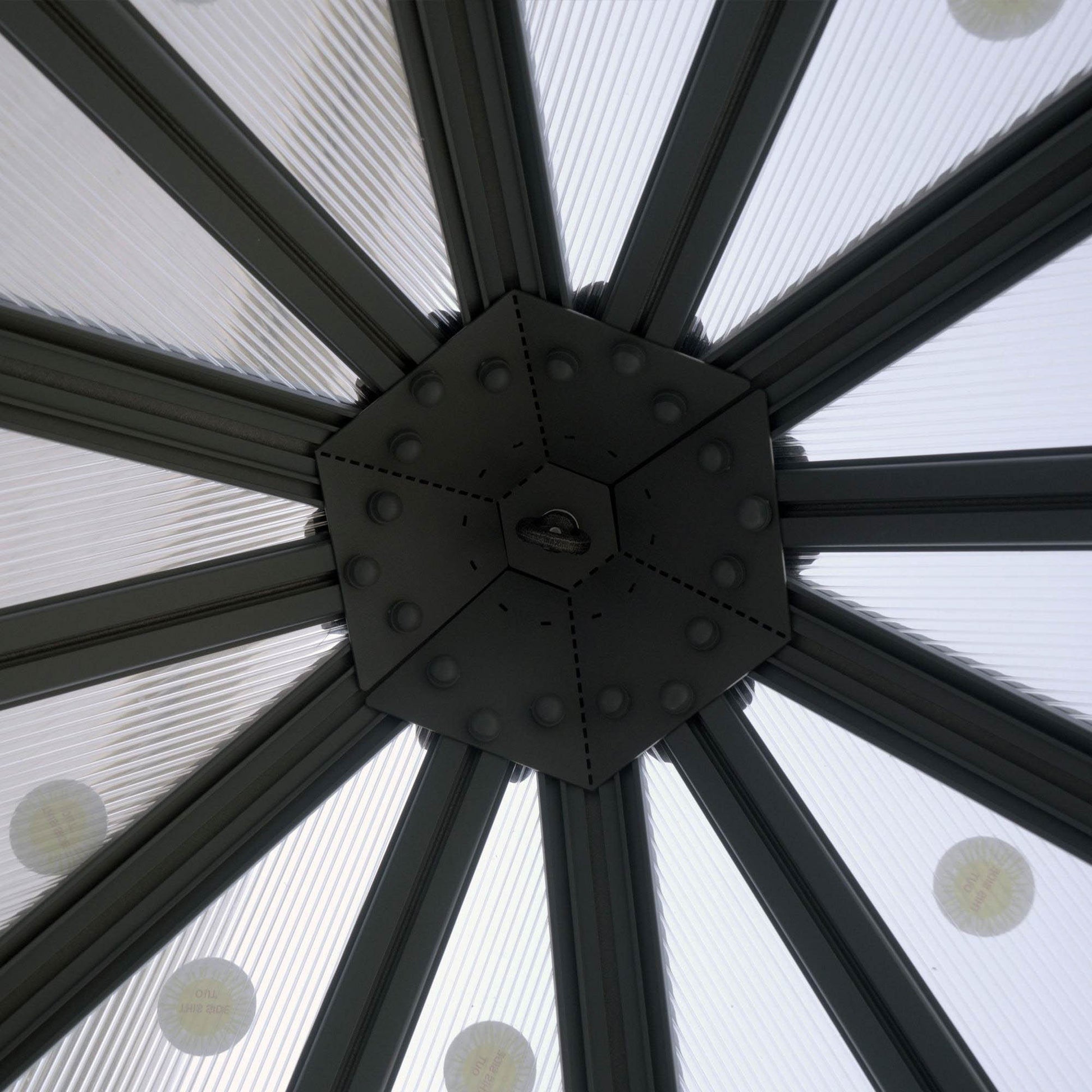 A hanging ring on the roof on a hexagonal greenhouse