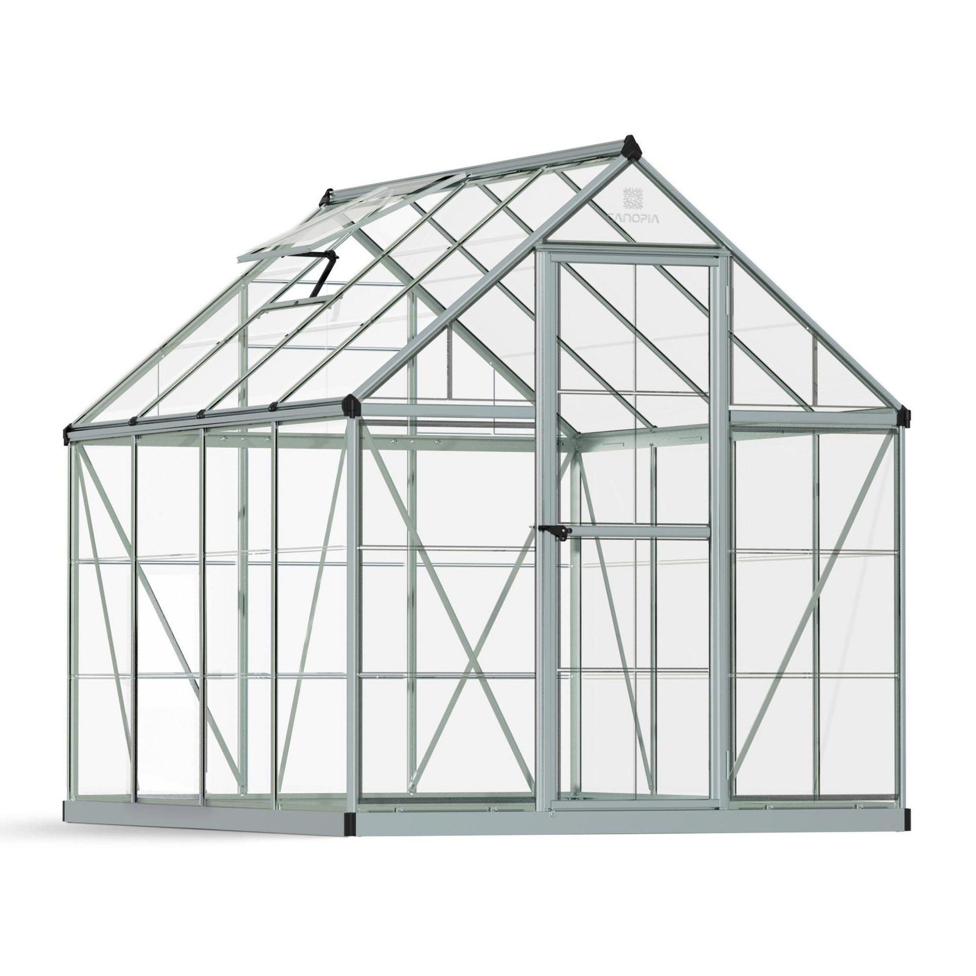 A greenhouse made up of windows with silver metal framing